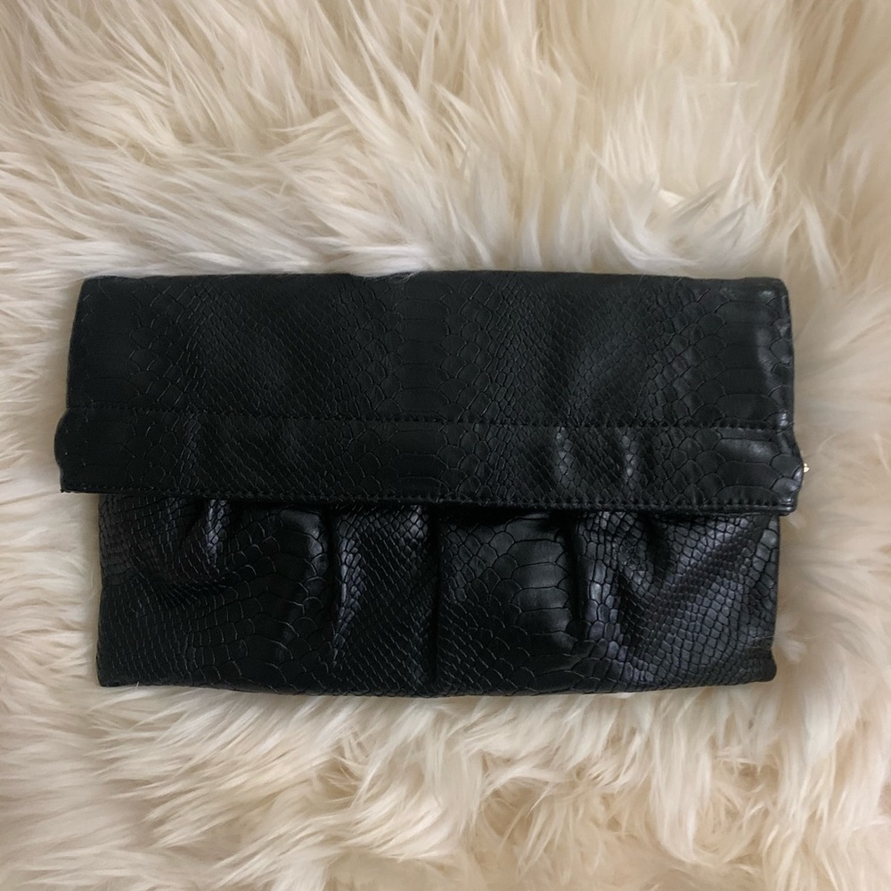 black snake print clutch bag